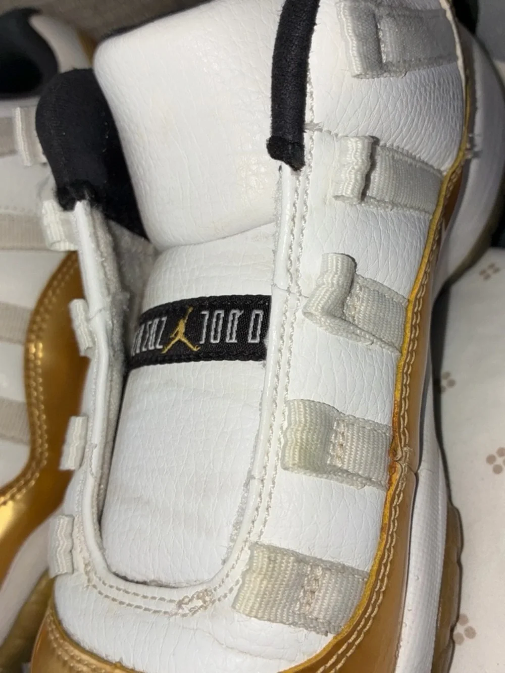 Jordan Kids White and Gold Metallic Toe Sneakers